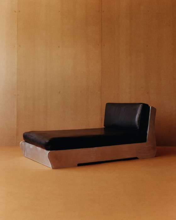 ALUMINUM AND LEATHER LOUNGE CHAIR, 2021